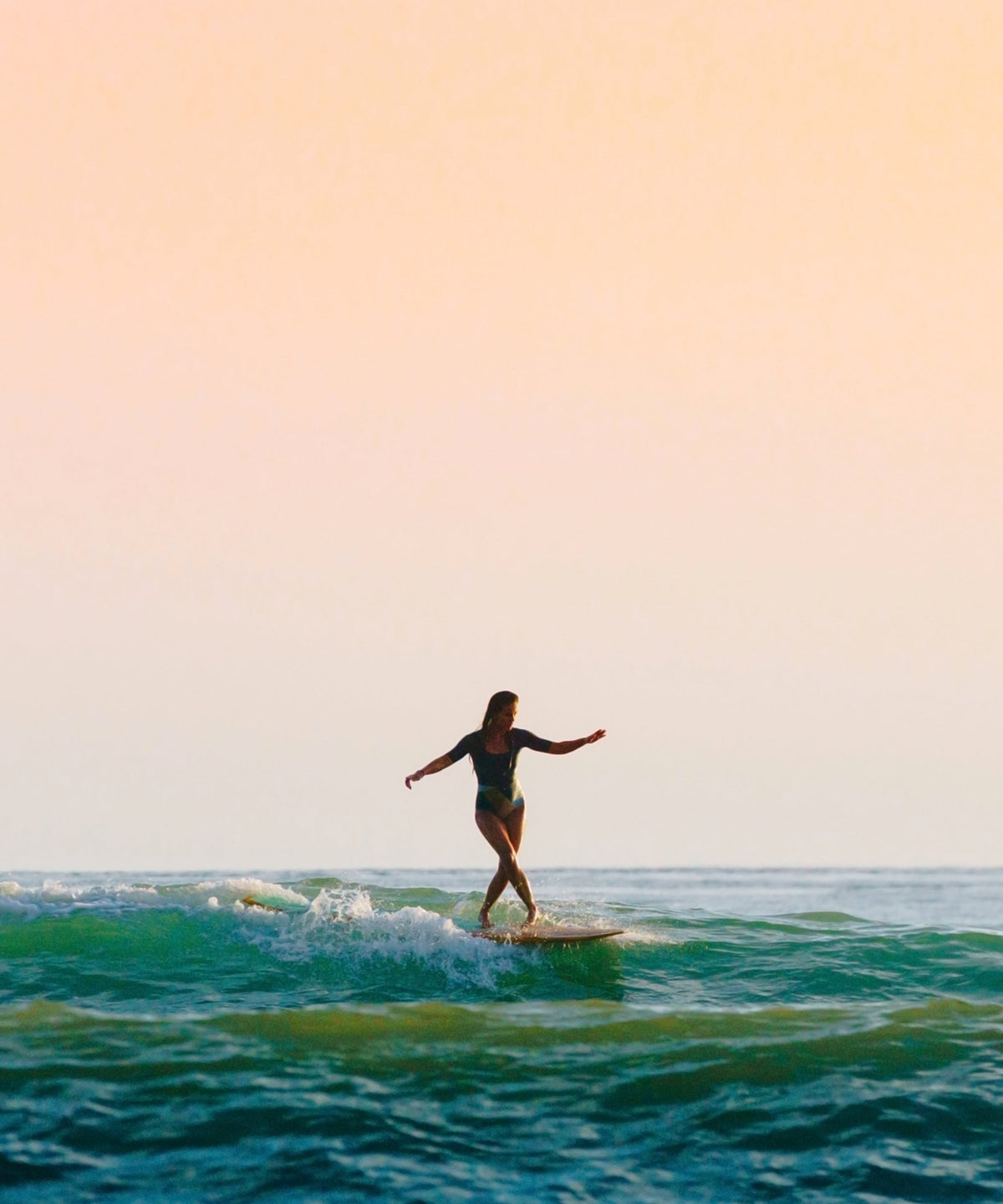 Surfing Sunsets #2 by Ben Christensen